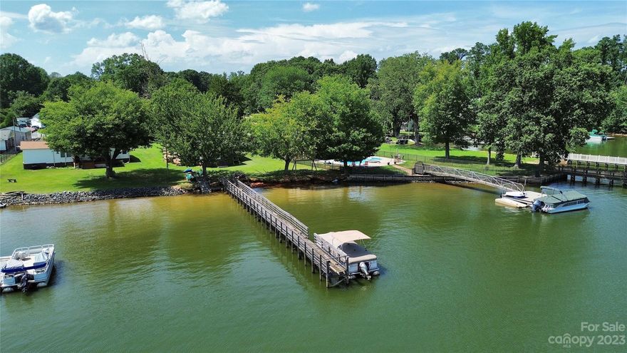 Your dream of living the lake life can come true! This waterfront home on High Rock Lake features peaceful long range views. The home has 3 spacious bedrooms and 1 full bath with an open floor-plan for the living room, dining room and kitchen. Enjoy watching the sun rise over the lake from the screened in, covered porch. The home also has a pier with a floating dock, perfect for the days you want to sit in the sun, dive in for a refreshing swim, or take a boat ride. The forested area across the lake is a Bald Eagle sanctuary, and there are several waterfront restaurants that are accessible by boat.