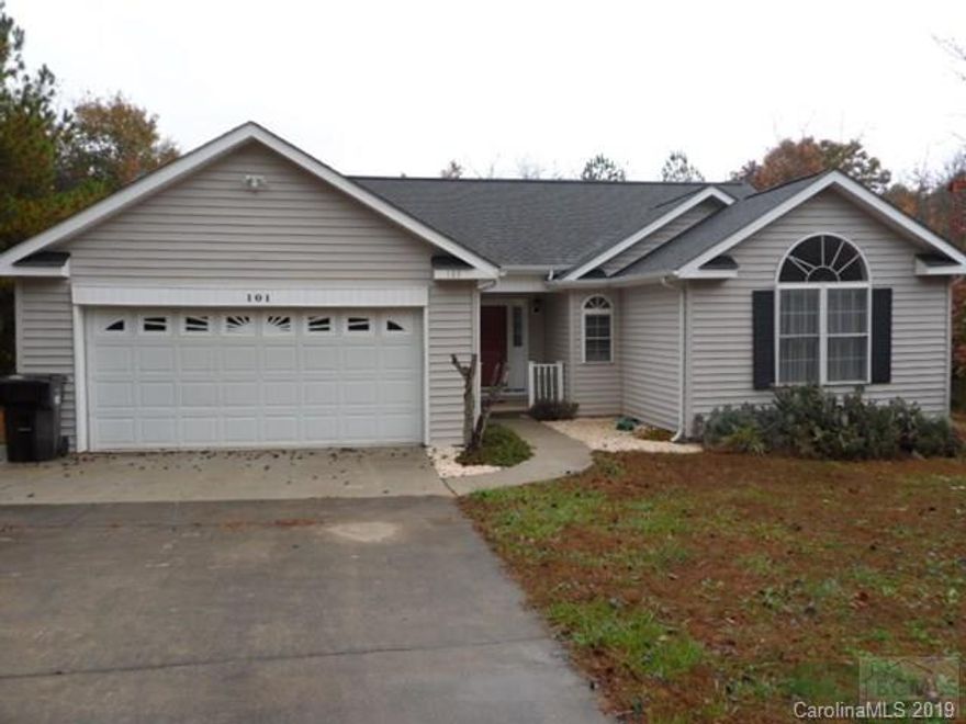 Three bedroom, two bath vinyl sided ranch style home on cul-de-sac street. Vaulted ceilings in living room & 1 bedroom. Freestanding gas fireplace in living room. Whirlpool tub in master bath.  Double garage. All appliances stay. Secluded neighborhood but close to downtown Rutherford College and I-40. Connelly Springs mailing address but is located in Rutherford College town limits.