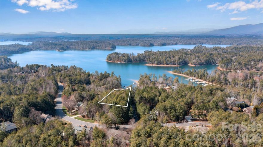 5029 Winfield Drive | Southpointe at Lake James — A Rare Waterfront Gem

Nestled on 1.13 acres with a beautifully cleared shoreline, ready for you to create unforgettable moments on the pristine waters of Lake James. This exceptional homesite invites you to design your dream retreat at water's edge where luxury living meets nature’s masterpiece.

Imagine waking each morning to the soft glow of sunrise dancing across the water and ending your evenings with breathtaking sunsets framed by the Blue Ridge foothills. Welcome to 5029 Winfield Drive—where every day feels like a retreat.

Nestled within the established Southpointe community, this property offers more than just a place to build, it offers a lifestyle defined by natural beauty, relaxation, and connection.

Conveniently located in the heart of Morganton, with easy access to Asheville, Hickory, and Charlotte.  Southpointe offers close proximity to shopping, dining, medical facilities, and outdoor recreation, including the scenic trails of the Fonta Flora State Trail.

Schedule your tour today, as this stunning waterfront homesite is truly a hidden gem. 

Dock Permit Status:  While the prior dock permit has expired, the seller will provide a credit at closing toward obtaining a new permit—offering a seamless opportunity to design and enjoy your ideal lakefront experience.
