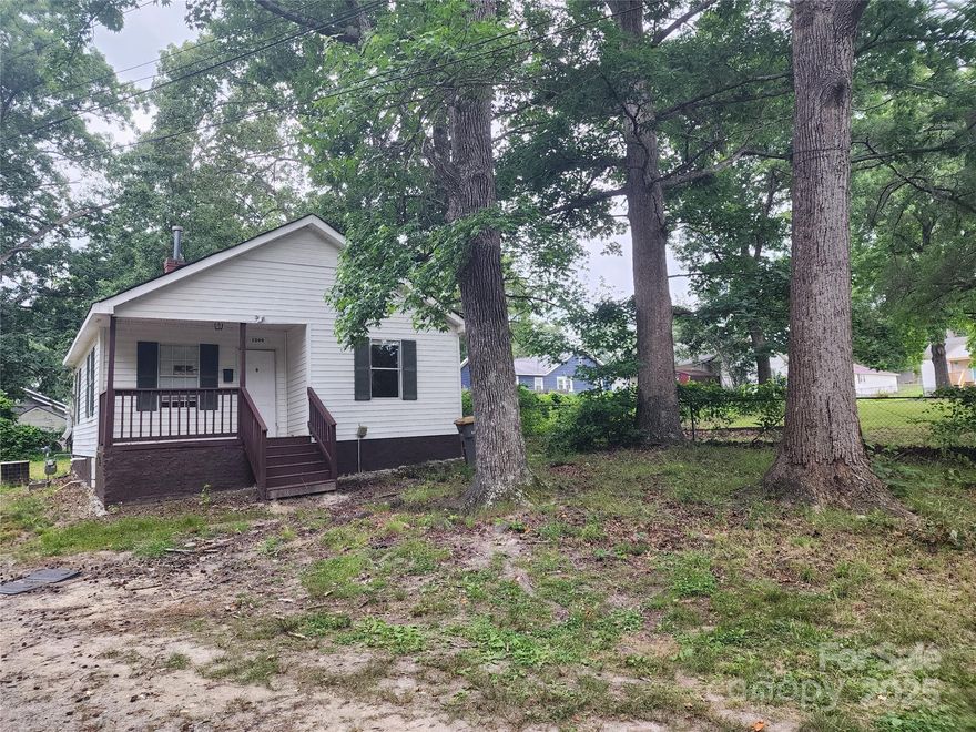Private location featuring a 2 bedroom 1 bathroom home.  Located down a shared driveway.  A new roof was installed in 2019.  New white kitchen cabinets and new vinyl plank flooring throughout.