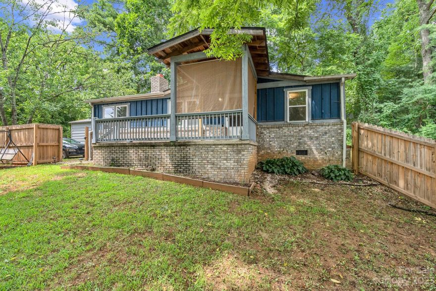 MULTIPLE OFFERS RECEIVED - OFFER DEADLINE 8/28 BY 5 PM.  Great rental investment or first-time home buyer opportunity.  Convenient South Asheville location with split bedroom plan - 3 bedrooms/2 bathrooms, open floor plan, fireplace with wood burning insert and large kitchen.  Fenced yard for privacy/pets. Property also features a detached 20 x 12 shop with light/outlet and roll up door on a concrete slab plus additional 6x6 shed.  This home is a great value in South Asheville!  Short-term rentals allowed.