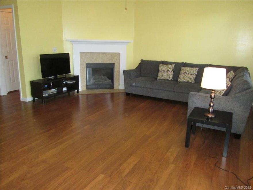 Convenient location. Walk to restaurants and shops. Whole house with 5" laminate flooring, except staircase. Refrigerator, washer, dryer will remain. Private patio w/ extra storage.