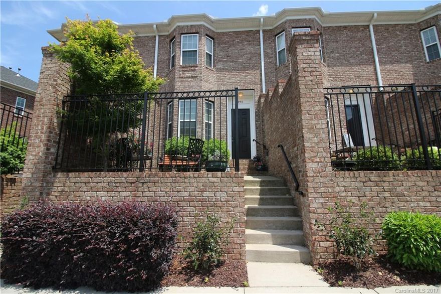 Don't miss your chance at this beautiful all brick town home in the desirable Afton Village.  Your gated front patio awaits you.  Home features beautiful hardwoods on the main floor & custom cabinetry in the Kitchen. Within walking distance to restaurants/shopping.  Less thank 1 mile from I-85. Make your appointment today!