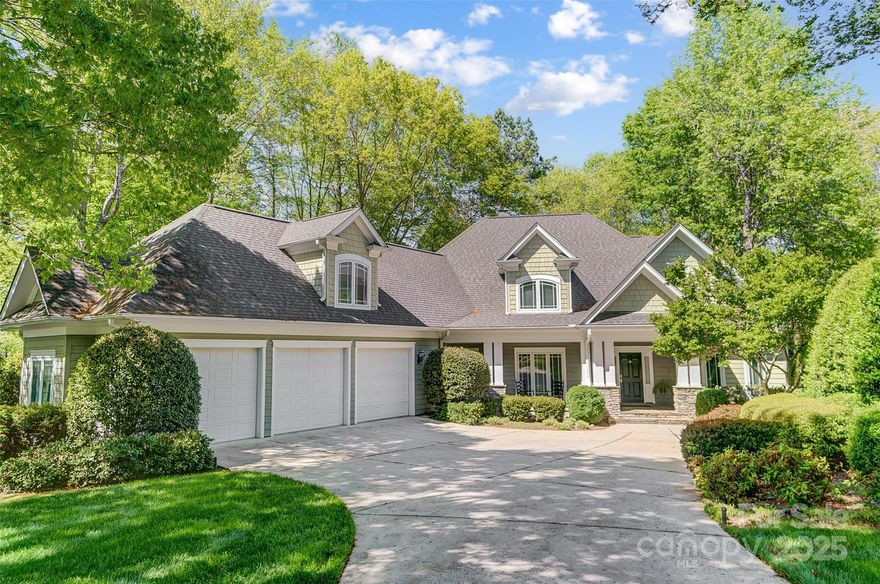 Stunning custom WATERFRONT home in Overlook on Mt. Island Lake, 5 spacious bedrooms and 3 full bathrooms, plus a half bath. The inviting interior features hardwood flooring, two elegant fireplaces, and an open-concept kitchen that flows into a large family room. The beautiful views of the lake in the family are exceptional. The family room features a cathedral ceiling, beams, and built-ins.  A charming front porch and a 3-car garage greet you, while the grand two-story foyer leads to a stylish dining room perfect for entertaining. The main floor's primary bedroom includes a luxurious en-suite bathroom and huge closet space.  Enjoy breathtaking water views from various rooms, an expansive deck, and a cozy screened porch. A 700 sq ft unfinished bonus room is ready for your creative touch. A low-maintenance composite deck pathway leads you to a serene gazebo and private dock, embracing the best of lake life. Located in a cul-de-sac, this home is just moments away from neighborhood parks.