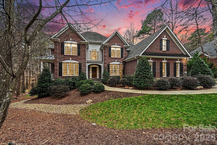 Luxury Lake Norman Living in Shavenders Bluff, Exceptional 4-bedroom, 4.5-bath home located in the desirable Shavenders Bluff subdivision of Mooresville. This spacious residence offers a thoughtfully designed open layout with abundant natural light and high-end finishes throughout. The large primary suite features a custom walk-in closet and spa-style bath. Kitchen is equipped with all updated appliances and opens seamlessly to main living areas, ideal for everyday living and entertaining. The finished basement provides additional living space and includes a workout room and full bar. Enjoy outstanding outdoor living with Pella French doors leading to a three-level deck from kitchen and basement level with a hot tub, and beautifully maintained grounds with irrigation system. Deeded boat slip on Lake Norman conveys, offering convenient access to boating and lake recreation. Boat slip with lift is in walking distance from the house. Community amenities include lake access,pool,beach, boat/trailer storage lot, boat ramp and walking trails. A rare opportunity to own a luxury home with both privacy and Lake Norman Lifestyle.This Home Is A Must See.

Sellers also have 23 foot Ebbtide bow rider with head and trailer for sale as well.