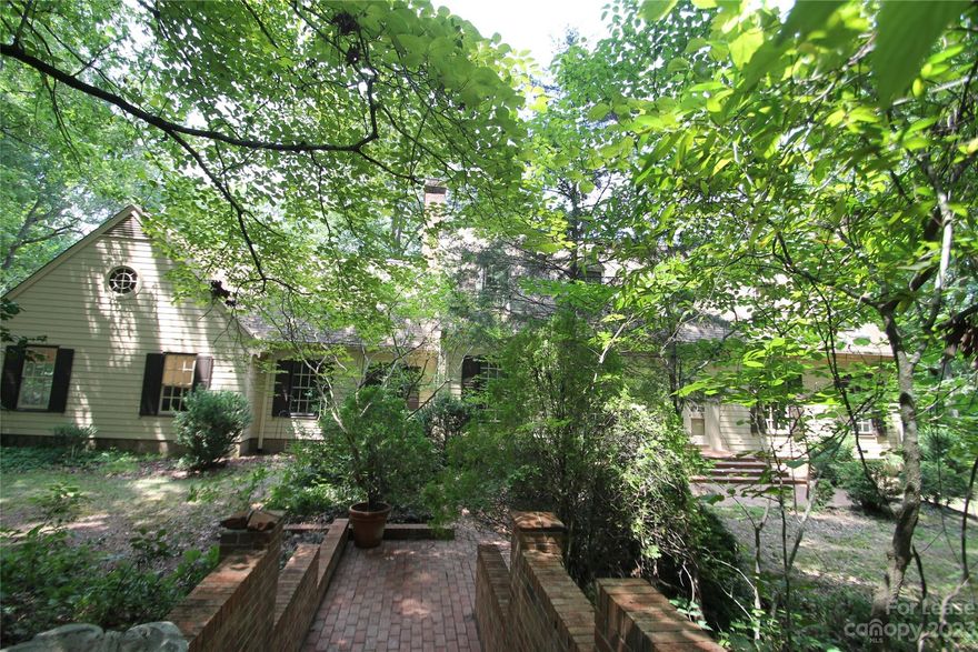 Beautiful Country Home Living but Located minutes from Downtown Area of Fort Mill, SC, 4 Bedrooms (1 Bedroom Downstairs & 2 plus Master on 2nd Level), Bonus Room on 2nd Level, 4 Bathrooms (1 on Main Level and 3 Upstairs). Formal Living Room, Formal Dining Room with Built in China Cabinets, Eat in Kitchen with nice size Island, Cooktop, Double Wall Ovens & Dishwasher. Family Room/Den off of Kitchen and Formal Dining Room has built in bookshelves and cabinets. A Grand bifurcated staircase from the entrance hall leads to the second floor which has 3 nice size bedrooms (One is the Master Bedroom) and Bonus Room. All Fireplaces are Non-operational.  2 Car Carport/Garage. Single Family Only. No Smoking/No Vaping. Call Owner for All Pet Permission (NO CATS-Prefer 1 small Dog with Approval). Max Occupants 5. Available NOW for viewing by key sign out from our office Monday-Friday from 9am-4pm, except Holidays. Keys to be returned by 5pm same day. Requires $20 refundable deposit.