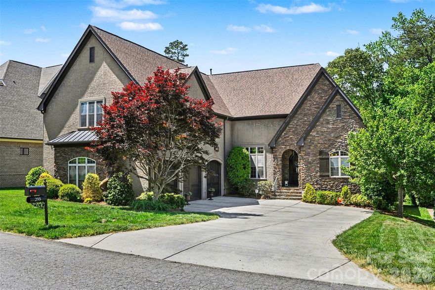 Nestled in the highly sought-after TreeTops at Cowans Ford, just off Hwy 73 in Lincoln County, this beautifully maintained and move-in-ready custom 2 story home offers a perfect blend of comfort, flexibility, and ample space for entertaining. The community boasts exceptional amenities anchored by Cowans Ford Golf Club offering various membership tiers, social offerings, a community pool, pickleball & tennis courts, dining, and access to Lake Norman (www.cowansford.com). This neighborhood is beautifully maintained with surroundings that provide privacy, charm, and southern elegance. 

Spanning just over 5,000 square feet, this home offers a harmonious blend of comfort and functionality. With five bedrooms, four full baths, a custom office, and a generous amount storage, it caters to various lifestyles and entertaining needs inside and out. The upper level features a spacious bonus or recreational area with its own custom bar, providing a unique touch to the home’s design.

The main level welcomes you into an expansive living area that seamlessly flows into the great room, dining area, custom office space, and chef’s kitchen. This spacious floor plan includes a cozy sitting area with a gas fireplace and French doors leading to an elevated deck overlooking the backyard, perfect for enjoying indoor-outdoor living. The chef’s kitchen stands as a true centerpiece, equipped with a large granite island, premium appliances, a gas range, soft close cabinetry, pull out shelving, and ample storage. Adjacent to the kitchen is a private guest bedroom and full bath, ideal for accommodating guests for any occasion. The primary bedroom offers a large privately positioned retreat from the day, seamlessly transitioning into an elegant ensuite. This ensuite features a double vanity, soaking tub, walk-in shower, and dual walk-in closets, providing a luxurious experience.

Additional main-level highlights also include a mudroom, laundry area, convenient hidden staircase access to the upper floor, and a spacious three-car garage with EV charging station, built-in storage units, and extended height garage doors for additional clearance.

The upper level boasts three additional bedrooms, two full baths, and an expansive bonus room. This versatile space can be transformed into a media room, playroom, or home gym, catering to diverse interests and needs. The bonus room also includes a large walk-in closet and a custom wet bar with ample counter space, perfect for entertaining guests during game day, private workout retreat, or hosting a family movie night.

The property is conveniently located in the Lake Norman area just minutes away from Denver, Huntersville, Cornelius, Birkdale, I-77 or NC-16 for access to Charlotte.

**Buyer incentives available"" - Down payment and rate buy down incentives available on this home with preferred lenders. Call for more information.