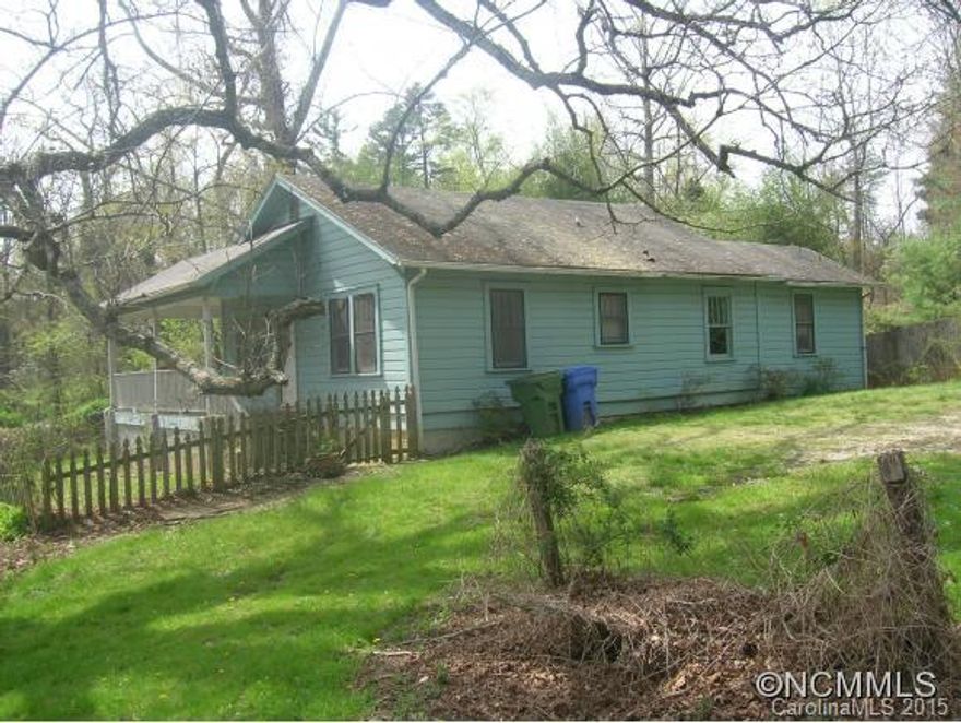Lots of potential with this bungalow located in the popular Haw Creek neighborhood, 1 exit from DT Asheville.  Sitting on .78 acres allows for further opportunities.  Great green space!