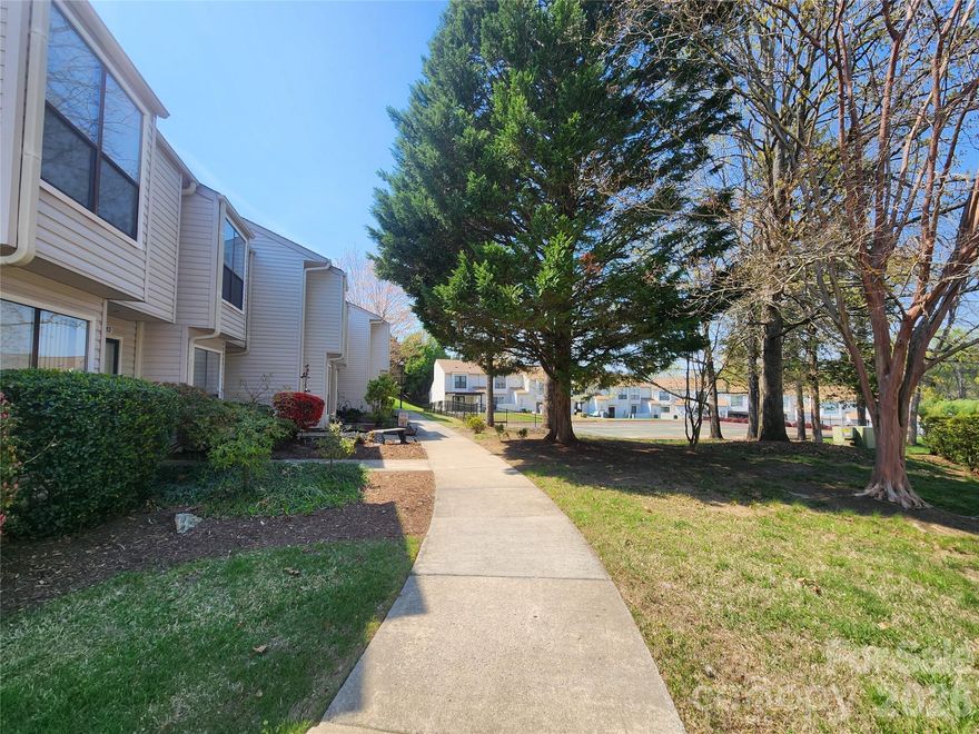 Welcome to Your New Home or Investment Property. Location Location Location!!!!!

This charming cozy 2-bedroom townhome offers the perfect blend of comfort and convenience, ideally located just minutes from the Ballantyne Bowl, but not Ballantyne prices. HOA COVERS WATER AND TRASH!  Located close to I-485, and SouthPark. 1st time home buyer or downsizing don't miss as you step inside, you’ll be greeted by a spacious, open-concept floor plan featuring a dedicated dining area and a cozy living room with a natural wood-burning fireplace – perfect for relaxing or entertaining. If you love to garden or just like the peaceful sounds of nature, you will love the privacy of the back patio.  This unit is set back in a little nook for extra privacy surrounded by trees
Enjoy seamless indoor-outdoor living with lovely French doors (installed in 2023) that open to a private patio – an ideal spot to unwind. Through the home you will find beautiful laminate wood flooring and upstairs you will find laundry and two generously sized bedrooms.
Residents can enjoy access to fantastic community amenities, including a refreshing pool and tennis courts. This townhome offers a fantastic lifestyle, and has no rental restrictions, great for investors.