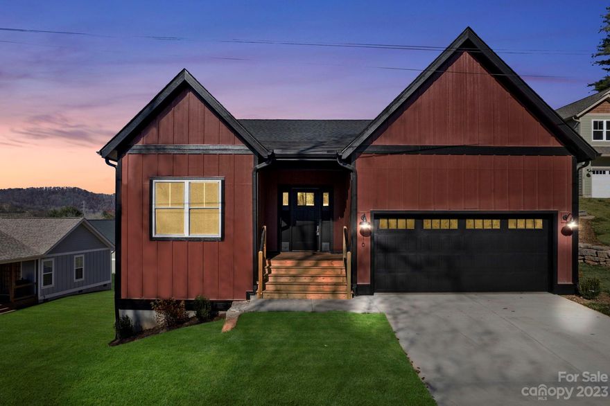 BACK ON THE MARKET due to no fault of the Seller. No detail was overlooked in this recent construction home in Arden! This single-story home features an open concept floor plan, spacious owner's suite, 9' ceilings on main level with vaulted ceilings in the great room, silestone quartz countertops in kitchen and bath, large laundry room, screened in rear porch with Trex decking and mountain views, and upgrades throughout. Upgrades include: wainscoting board and batten trim in entryway, media wall built-ins with shelving, hardwood flooring, custom closet system with wood shelving in main bedroom, electric car outlet, custom window tint with blinds, and more. Surrounded by all of the beauty that the Arden area has to offer and only 1.8 miles from Biltmore Park Town Square, Ellis Place is the perfect place to call home. You don't want to miss this opportunity!