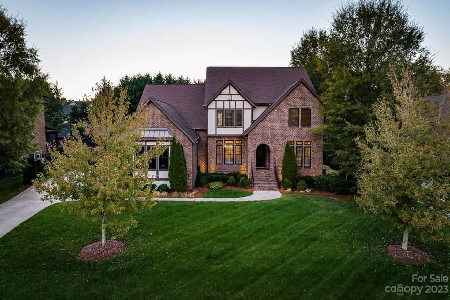 Experience country club living at its finest with this exquisite home in the private Longview neighborhood. Main floor flows beautifully from curved stairway in the 2-story foyer, opening to living areas, study, and the primary and secondary bedrooms. Pristine kitchen offers stainless steel appliances including double wall ovens and GE monogram gas cooktop with hood, as well as a butler's pantry. Upper level includes three additional bedrooms, large bonus room with endless opportunities for flexible use, and an impressive home theater room. Stunning outdoor living spaces including the covered back patio with fireplace that overlooks flat, plush backyard. Additional features of note are plantation shutters, coffered ceiling in study, stone fireplace in living room, as well as stone fireplace in hearth room, drop zone, and overhead storage in garage.