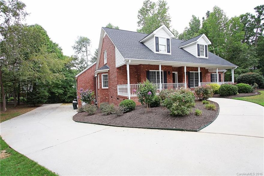 Don't miss this rare find! Full brick cul-de-sac home on nearly an acre within a few miles of I-77, and no HOA's. Lg kitchen open to family room, spacious bonus room with wet bar, screened porch, wooded lot, oversized master bedroom with trey ceilings, master bath with garden tub, glass shower, and dual vanities. Walk-up attic is plumbed for a full bath and ready to finish. 2 car garage and workshop in basement. Roof is approximately 4 years old and HVAC is less than 6 years old.