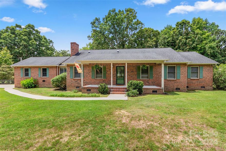 Welcome home to this cozy brick ranch nestled on a large lot in a sought-after location within the Lewisville School district. This residence offers a functional layout with 3 spacious bedrooms, 2 full bathrooms and a bonus space/den off of the kitchen. The home also provides an attached two-car garage for your vehicles and storage needs, as well as a three-bay detached garage offering ample space for a work shop, hobbies and more! Outside you will be able to enjoy an expansive back deck, fenced backyard, in-ground pool and a wired pool house. This home is situated conveniently close to schools, shopping, and major interstate access, ensuring ease for daily living.