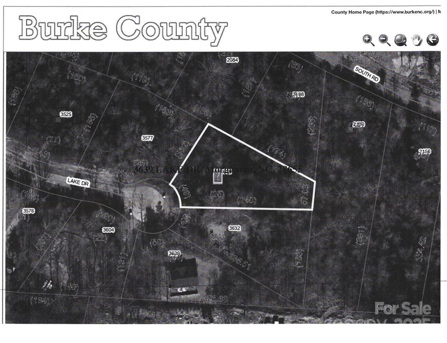 This lot has a mild slope.  It is in the Oak Hill area and is close to shopping, medical care, and restaurants.  It is only 10-12 miles from Lake James and is in a small neighborhood tucked away from the main roads.  There are more lots available.