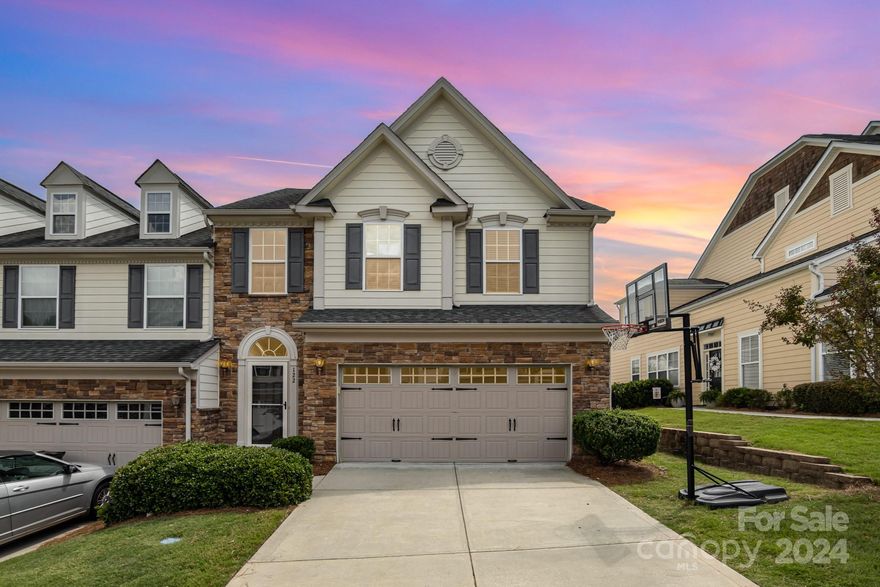 You don't want to miss this convenient and desirable location townhouse in Tega Cay Beach Club neighborhood! 3BR, 2.5BA, 2 car garage move-in ready! Spacious kitchen features additional cabinets added, granite countertops, and stainless steel appliances. The main level hosts a spacious primary suite with a ensuite and walk-in closet. The open living and dining areas feature a 2-story vaulted ceiling, creating an inviting ambiance. Upstairs, two bedrooms with wooded views. Residents benefit from the community's amenities, such as walking trails, lake beach access, play grounds, and proximity to Fort Mill's esteemed schools. An exceptional home in a highly sought-after location!