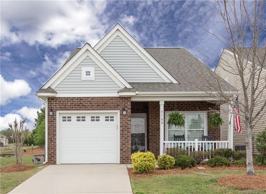 This beautiful home in popular Newport Lakes may already look perfect from the outside, but just wait until you step through the door. You'll be greeted by gorgeous laminate wood flooring and an open and inviting living space right off a naturally lit kitchen, complete with a wired island. Enjoy main level living with both the master and a guest room on the first floor, and wind down from a long day in the cozy bonus upstairs. Throw in a fenced backyard and all you've got to do is turn the key!