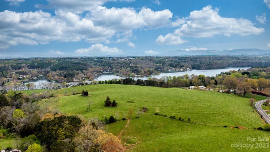 Amazing opportunity to own approximately 22 acres on main channel lake hickory! Over 400 feet of waterfront, this beautiful property is mostly cleared and sown in grass. From Hwy 127 bridge you can see this one of a kind property majestically looking down on the lake. If you are looking for a perfect, secluded lake front estate to build your home-then this is the property for you! If you are a developer/builder-this is your opportunity to build a wonderful, new lakefront community in Hickory NC-recently named the No. 1 most beautiful and affordable place to live in the US by Travel and Leisure Magazine.