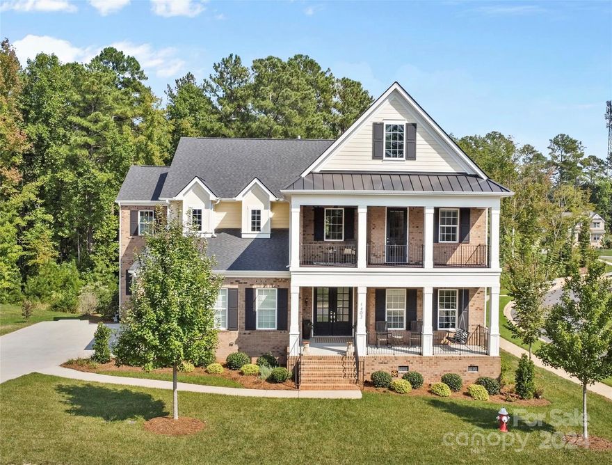 This like new home in The Falls at Weddington is everything you've been looking for and more. The main floor is equipped with 10' high ceilings, custom millwork throughout including not one but TWO full refrigerators and dishwashers and a beverage refrigerator. Enter through the double front door or from the garage to the mudroom and step into an open floor plan with an office, formal dining room and breakfast area that can fit a large dining table. The main level also includes a large guest bedroom with ensuite bathroom with a walk-in shower. The kitchen has a large island, pantry, and secondary kitchen area perfect for entertaining! Step outside through the massive sliding glass doors to the deck and enjoy the wooded back yard view. The primary suite feels just like having your own spa experience every day! Come see this amazing newer built home that checks all of your boxes!