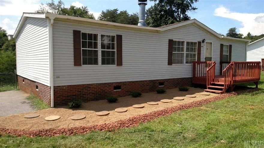 Spacious 3BR/2BA home with lots of storage in the kitchen and a fireplace in the living room. New flooring and freshly painted!  Fenced back yard with newly updated landscaping - must see!