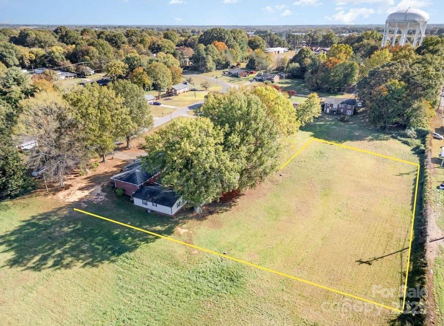 *** BACK ON MARKET. NO FAULT TO SELLER***Very Motivated Seller – SOLD AS PACKAGE DEAL W/ MLS #4314418
Discover endless possibilities with this rare package offering of five adjoining parcels totaling approximately 1.42 acres (Parcel IDs: 4744.83.2544, 4744.83.0345, 4744.83.1325, 4744.83.1525, 4744.83.0554). No HOA!
One parcel features a stately all-brick home offering 6 bedrooms, 4.5 baths, and over 4,100 square feet of versatile living space. This traditional residence is rich in charm and functionality. The main level boasts spacious gathering areas, including a bright family room with picture windows, a formal dining area, and a welcoming kitchen ready for your personal updates. Each bedroom is generously sized, providing comfort and flexibility.
The lower level greatly expands the home’s potential, featuring a full in-law or guest suite complete with additional bedrooms, a full bath, a cozy living room, and a kitchenette—ideal for entertaining or extended family living.
Outside, enjoy a 3-car detached garage, paved driveway, covered patio, and a fenced courtyard that connects the home to the surrounding parcels. The lots form an L-shaped layout, offering privacy and ample room for future development, gardens, or recreational space.
Whether you’re envisioning a private estate, multi-generational retreat, or investment opportunity, this distinctive package delivers exceptional value, flexibility, and potential—all just minutes from local amenities, shopping, and dining.