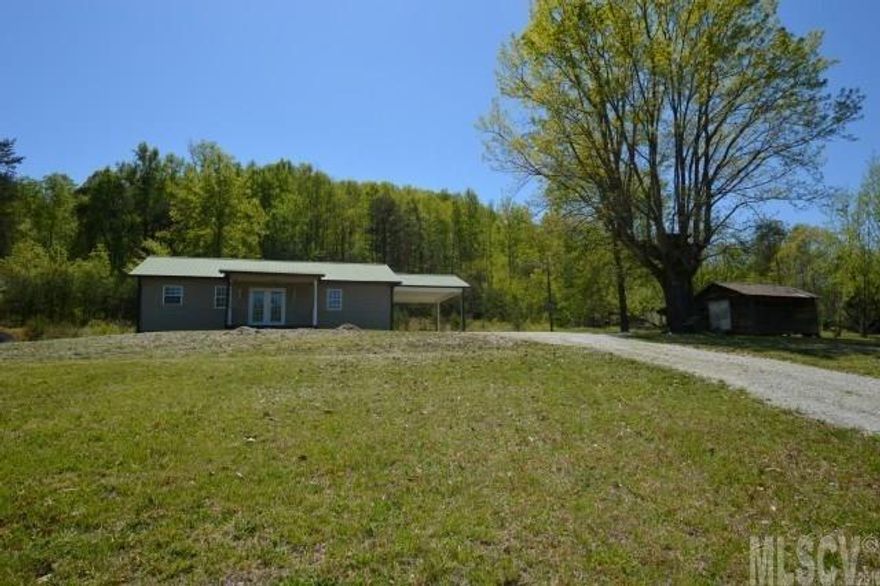 Renovated house perched up on a hill in Dudley Shoals on 1.97 acres with long range mountain views. Metal roof, vinyl windows, new heat pump, gutters, downspouts, carpet, vinyl, interior paint, and refaced kitchen cabinetry. Huge front yard and good sized outbuilding.