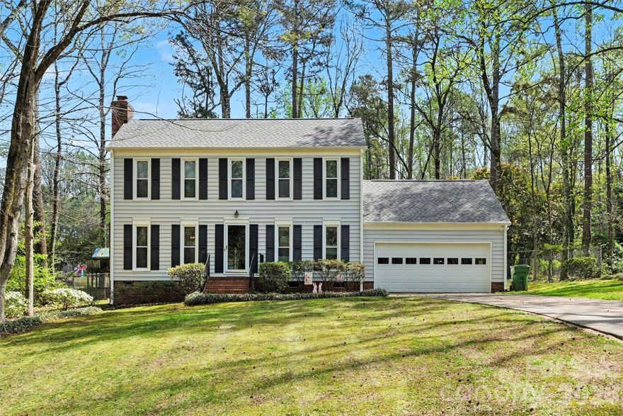 Great subdivision with large lots and mature trees! Home is lovely and well kept! New roof in 2025, new laminate flooring, porcelain tile, counter tops and backsplash in 2009, up stairs laminate 2010, new windows in 2010, new garage door in 2019, new glass doors in 2008. Spacious bedrooms and great nearly 1/2 acre lot.  Cut-de-sac.  Close to downtown Fort Mill for shopping, dining.  Excellent Fort Mill School District.  Convenient access to I-77. Lots to love - private, spacious, lots of yard.  Great location! Great home!