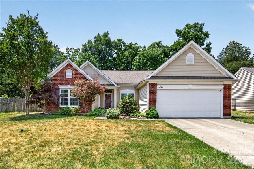 Charming brick-front ranch in the desirable Greybriar community in the Steele Creek area! This well-maintained 3-bedroom, 2-bath home features an inviting open floorplan with thoughtful architectural details throughout, including a beautiful arched entry from the foyer to the dining room, crown moldings, chair rail molding, wainscoting, and 2” blinds. The spacious living area offers a cozy gas log fireplace and flows seamlessly into the dining and kitchen spaces, creating an ideal layout for everyday living and entertaining. Flooring includes a stylish mix of LVP, tile, and carpet. The split-bedroom floorplan provides privacy for the primary suite, which features a beautifully renovated bath with an expanded shower, new vanity, and a unique towel-drying nook accented by an attractive barn door. The secondary bath has also been updated with a newer vanity. Additional highlights include brand new windows installed in 2025, a Vivint security system, the fenced backyard, and a 2-car garage with added shelving for storage. Conveniently located near shopping, dining, Lake Wylie, and Charlotte Douglas International Airport, this move-in ready home offers comfort, style, and an excellent Steele Creek location!