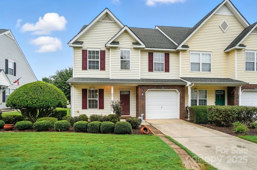 Step into this meticulously maintained 3-bedroom, 2.5-bath end-unit townhome with the primary bedroom on the main level! Enjoy an open, airy layout with a spacious two-story living room and a large kitchen featuring ample counter space and newer stainless steel appliances. Upstairs offers two additional bedrooms, a full bath, and a flexible loft—perfect as an office, lounge, or additional TV room. Relax on your private rear deck, surrounded by custom hardscaping and mature shrubs. Recent upgrades include LVP flooring throughout (no carpet) and fresh paint. Additional features include a 1-car attached garage and access to the community pool and playground. Located in the desirable Indian Land school district, with no rental cap and just minutes from Ballantyne! With an easy commute to Charlotte, new retail centers that include the new Costco, Lowe's Foods, and more, don't miss out on this excellent opportunity!