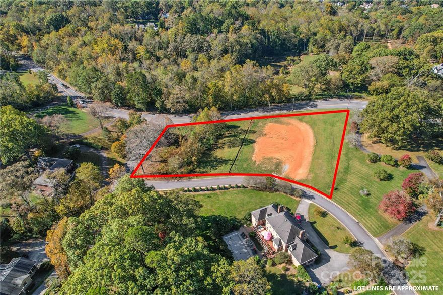 Dreaming of building in one of Hickory’s most prestigious neighborhoods?
This 2-acre homesite in Foxcroft offers the ideal setting for your custom-built home. The property is build-ready and already graded, with city water and sewer extended to the lot—saving you both time and expense. Please note that the lot cannot be subdivided, ensuring lasting privacy and exclusivity.