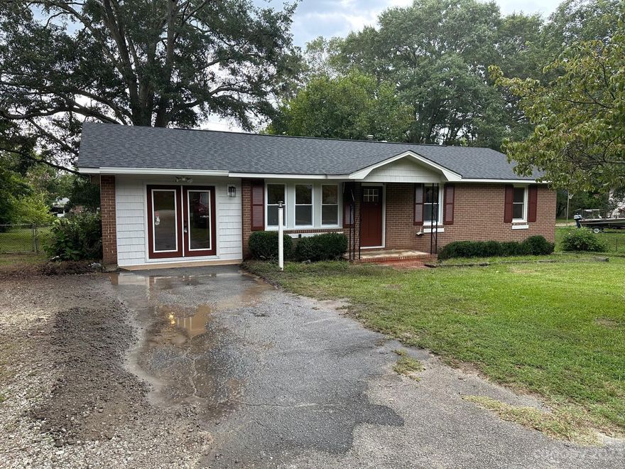 Great price, newly renovated, 3 bedroom, 2 bath brick ranch in Spartanburg, won't last long. Home has all new vinyl windows, new LVT flooring throughout, new appliances and many other updates. The kitchen has new cabinets and new stainless steel appliances. From the dining area you can step through the sliding glass doors onto the new 32x12 deck. In the fenced in yard there is a 10x16 building with a 12x14 lean-to.  Back inside the master bedroom has a walk-in closet and the master bath with a new walk-in shower, vanity and toilet.  There is a spacious Den for extra living space and two other nice sized bedrooms as well as an additional bathroom with tile backsplash, and new vanity and toilet.  The architectural roof is less than 5 years old. This is a great property, schedule your showing today.