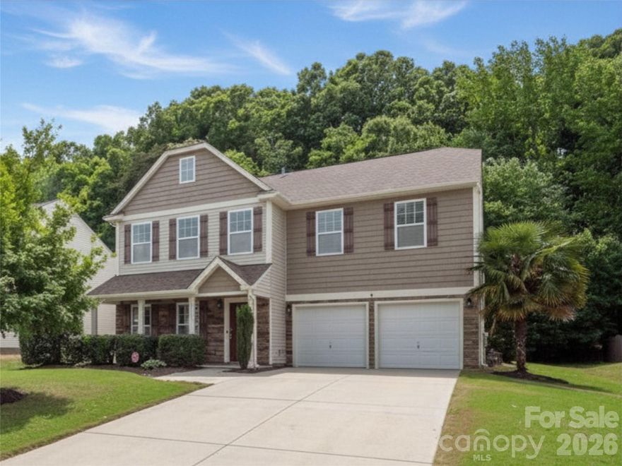 Experience the perfect blend of space, style, and resort-style living in this beautifully maintained home located in one of Indian Land’s most sought-after areas with low South Carolina taxes and top-rated schools. The spacious open floorplan is highlighted by a dramatic two-story great room filled with natural light and a beautifully updated kitchen featuring a large quartz island—ideal for entertaining and everyday living. Rare dual primary suites include a luxurious primary bedroom on the main level, offering exceptional flexibility and comfort. Conveniently located near Ballantyne, Fort Mill, and all that Indian Land has to offer. The true showstopper is the private backyard oasis complete with a sparkling pool, lush landscaping, and a peaceful retreat-like setting perfect for relaxing or entertaining year-round.