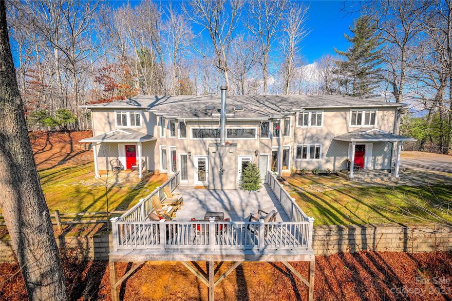 Discover the perfect blend of updated luxury and versatility in this stunning 6-bedroom home with 4.5 baths and 5438 square feet of living space. Property is offered below recent appraisal $790K. Enjoy soaring ceilings, two fireplaces (Wood & gas), and ample natural light in the open floor plan. Don't miss the chance to own this spacious retreat, just minutes from Asheville, Waynesville, and the beauty of the Great Smoky Mountains. On Main: Kitchen is convenient to the 'fenced yard', Hot Tub, dining, oversized garages, great room, den and game room/master suite (ensuite bath). Upstairs: Loft, Large 2-bedroom suite with Media Room & tile bath. 2 more Guest Rms, hall bath, laundry room plus primary suite with dressing area and tile shower. Level parking. City streets, water, sewer.. Generator. Request 'Additional Info' & Home Inspection. This centrally located home is ideal for a large family or vacation rental. Spectrum Internet, RV Parking. Avail Furnished -Multiple Offers..