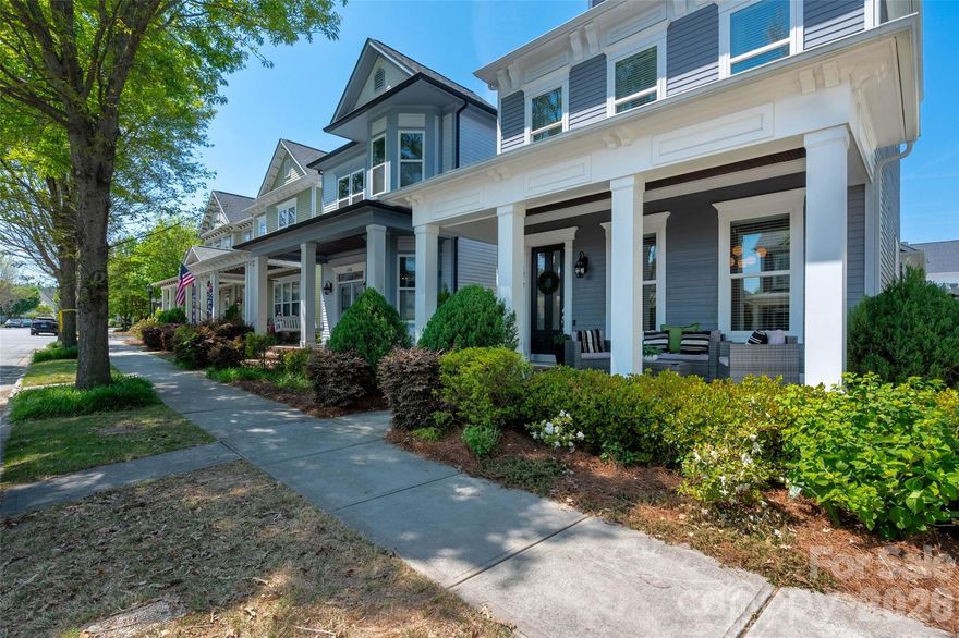 Welcome to Antiquity—where charm, walkability, and lifestyle come together in one of Cornelius’ most sought-after communities. Sidewalk-lined streets connect residents to neighborhood parks, scenic greenways, and all the best of nearby Downtown Cornelius and Davidson, where you’ll enjoy restaurants, coffee shops, boutiques, arts, and everyday convenience just minutes away. This beautifully crafted Charleston-style home, built by Cunane Homes, welcomes you with an inviting front porch—perfect for unwinding at the end of the day. Step inside to an open and airy floor plan freshly painted throughout, featuring crisp white kitchen cabinetry and timeless finishes.
The kitchen is truly the heart of the home, complete with a large center island, granite countertops, gas cooktop, stainless steel appliances, and freshly painted white cabinetry. It flows seamlessly into the dining area and spacious living room, where a cozy gas fireplace creates the perfect gathering space. Just off the kitchen, enjoy a private porch ideal for your morning coffee or evening relaxation. A standout feature of this home is the rare main-level primary suite, offering the convenience of first-floor living. This spacious retreat provides comfort and privacy, complete with a generous walk-in closet and an en-suite bath designed for everyday ease. Whether starting your day or winding down in the evening, this private space offers the perfect place to relax and recharge.
Nearby, the laundry room connects to the rear-entry two-car garage, equipped with an electric vehicle charger for added convenience. Upstairs, you’ll find generously sized secondary bedrooms connected by a Jack-and-Jill bath, along with an expansive walk-in storage area—providing exceptional storage throughout the home.
Residents of Antiquity enjoy the amenities including a swimming pool, dog park, and walking trails. Don’t miss this rare opportunity to own a stunning home in one of Cornelius’ most desirable communities. The For Sale sign will be placed in the yard on 5/1.