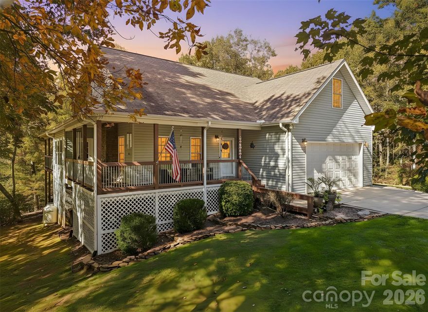 Spacious Flat Rock Home with Flexible Living Areas – 4BR / 5BA on 1.49 Acres

Welcome to your Flat Rock retreat! Nestled at the end of a quiet cul-de-sac, this 3,814 sq. ft. home offers space, versatility, and comfort on a beautiful 1.49-acre lot—just minutes from shopping, downtown Hendersonville, and historic Flat Rock.

Inside, the main level features an inviting family room, a well-appointed kitchen, and a primary ensuite bedroom designed for relaxation. A second bedroom and a full hallway bathroom provide convenience for guests or family.
Upstairs, you’ll find two additional bedrooms, a full bathroom, and a den —ideal for a play area, media space, or quiet retreat.

The lower level offers even more possibilities with a small separate kitchen area, comfortable living space, office area, and two full bathrooms—perfect for guest quarters, or a private work-from-home setup.
An oversized 2-car garage on the main level and a workshop area in the basement provide plenty of storage and workspace for hobbies, tools, and projects.

With thoughtful design and flexible spaces throughout, this home offers the best of mountain living with easy access to all the conveniences of Flat Rock and Hendersonville.