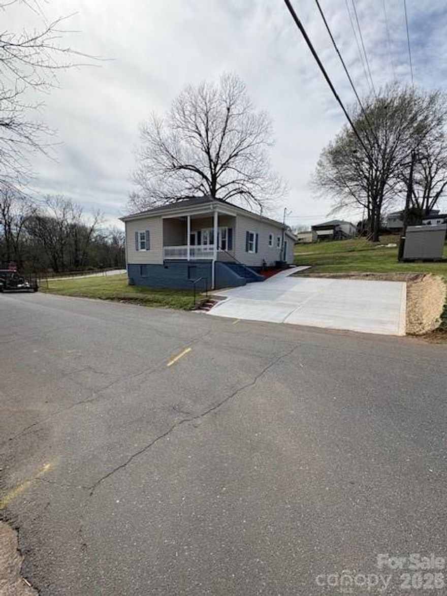 This beautifully renovated 2 Bed/1 Bath home is located in the popular Historic Old Town Community of
Cramerton. This property is on a corner and unique to Old Town to have a very large side lot. The
spacious kitchen has new cabinets with soft close drawers and doors, new granite, tile backsplash and all
new stainless steel appliances. The roomy bathroom/Laundry Room has a fully tiled new tub, new bath
Vanity and top plus all new fixtures. You will find all new lights, ceiling fans, window blinds throughout
as well as freshly painted walls and ceilings. All flooring in the home is new maintenance free Luxury
Vinyl Plank. There is a new concrete driveway and sidewalk to the home. For outside storage there is
freestanding storage shed. This home is a perfect location to walk to downtown Cramerton to shops,
restaurants and Goat Island Park with its walking trails, picnic area and playground. Directly across the
street is Riverside Park and Greenway, including a Basketball court as well as access to additional
walking trails and community fishing pier. As a resident of Cramerton you have free use of the Cramerton Recreation pool and for a small monthly fee you can join the Recreation center which includes a weight room, gym as well as opportunities to play Pickle Ball. With all these great added benefits as a Cramerton Resident this is a must see home!