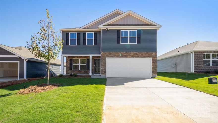 Wildbrook Village, a new community nestled just beyond the borders of Maggie Valley. Minutes from downtown Waynesville with a lively Main Street that has many local restaurants to choose from and charming stores for shopping. This popular floor plan features a flex space, as well as 4 bedrooms on the second floor. The kitchen welcomes you with a chef’s island, beautiful countertops and ss appliances. Primary bedroom is large enough to accommodate any furniture size or style and includes a generous walk-in closet. Bedrooms 2 and 3 are oversized, with walk-in closets of their own and offer plenty of space for everyone. Smart home package included. *Home features are subject to change without notice. Internet service not included. Sq footages are approximate*