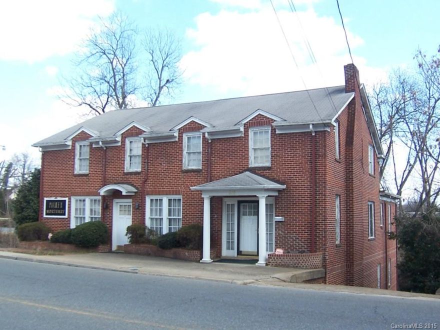 Approximately 4700 square feet.  Large basement/garage.  Corner lot.  Paved parking and freight elevator.  General business office/retail building priced to sell.  Reduced to $50,000.  Sold as is - seller will make no repairs.