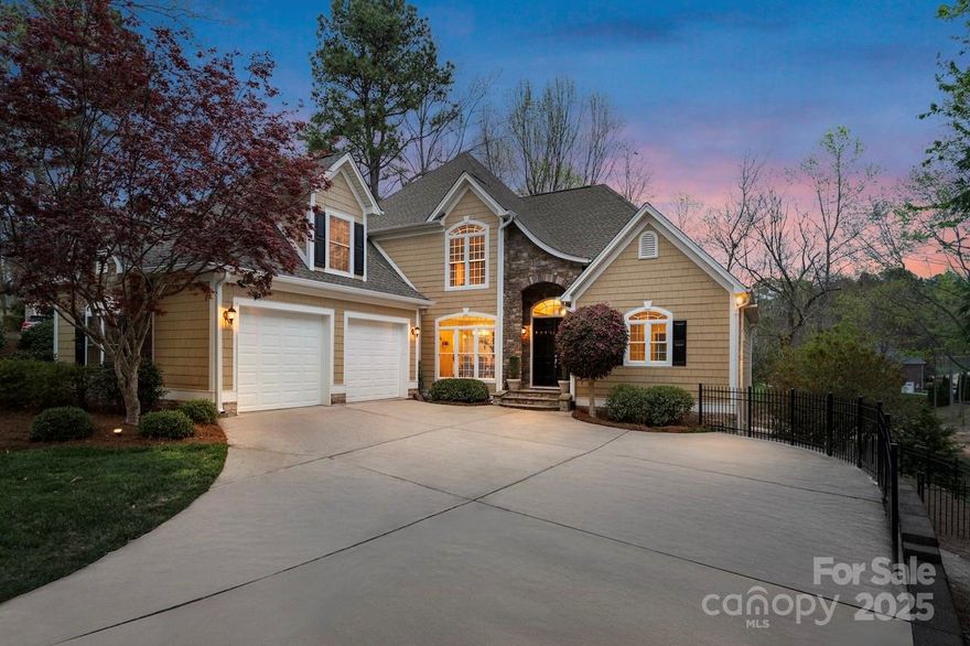 Tucked into a quiet cove with year-round deep water and stunning lake views, this newly remodeled 4,600+ sqft waterfront estate in the highly sought-after Northview Harbour community is luxury living at its finest. With 4 beds, 4.5 baths, and fully updated mechanicals, this home features a beautifully appointed open floor plan, new high-end granite in both kitchens, main-level primary suite, and second living quarters with a full kitchen, and theater. Enjoy evenings on the brand new screened porch or around the lakeside firepit. The floating dock with lift sits in protected waters just off the main channel. Professionally landscaped grounds with irrigation, a fenced backyard, and ample outdoor entertaining space complete the picture. Recent upgrades include new roof, hardwoods, custom stone front steps, stamped concrete patio, and fresh paint inside and out. Community amenities include Olympic-size pool, pickleball, clubhouse, and more. A rare blend of elegance, comfort, and location.