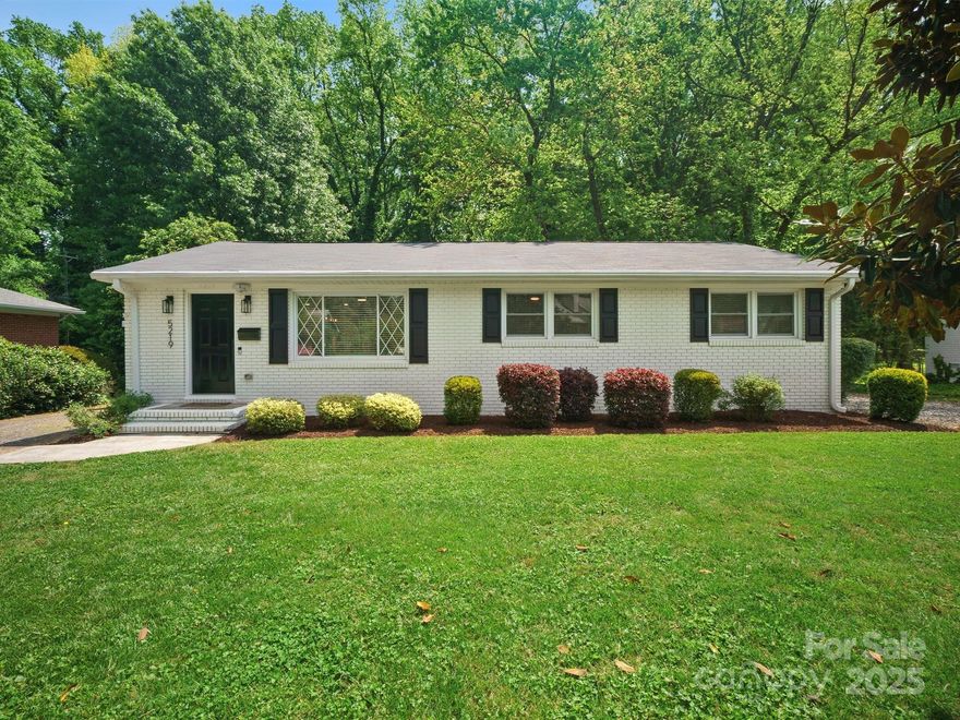 Completely renovated ranch just minutes from South End and SouthPark! This 3-bed, 2-bath open concept home features a brand-new roof, all new electrical and plumbing (including fixtures), refurbished HVAC system, freshly painted brick and fiber cement siding. Inside, enjoy new insulation, drywall, doors, trim, and LVP flooring throughout. The kitchen boasts custom cabinets with soft-close hinges, quartz counters, a large island, brand-new KitchenAid appliances, and stylish finishes. Spacious primary and guest baths have been fully redesigned for comfort and function. Overhead electrical lines removed—power and data now underground, restoring space to the back yard. Outside, relax on your new concrete patio in a fenced backyard. Located within walking distance to Sugar Creek Greenway and just 15 minutes from Uptown Charlotte. Truly move-in ready with modern upgrades in every room!