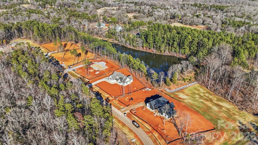 Discover Southern Pine Lake, Clover’s newest upscale community where luxury meets convenience. Tucked away in a tranquil setting, this exclusive enclave offers 36 spacious homesites, each spanning over one acre, providing privacy and serenity while remaining just minutes from big box stores, restaurants, shopping, and major thoroughfares. Enjoy an easy drive to Uptown Charlotte and CLT Airport, making daily commutes and travel effortless. Clover’s highly rated schools, strong sense of community, and commitment to quality living make it one of South Carolina’s most desirable places to call home. Southern Pine Lake blends thoughtful planning with timeless appeal, creating the perfect environment for families to grow and thrive. Come build your dream home and experience the unmatched lifestyle this special community offers.