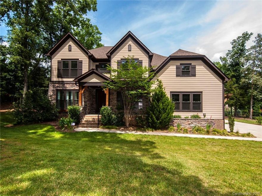 Located in Heron Cove a lakefront community.  Versatile open floor plan. Hardwoods throughout. Formal dining room. Kitchen with large island and breakfast nook. Butler’s pantry. First floor guest suite with full bath.  Study.  Master with a spa like bath on second floor. Two full baths, three bedrooms and bonus room. Laundry room on both floors. Garage with custom storage areas.  In ground pool with hot tub.  Deck overlooking wooded back yard.  Stone fire pit.  Fenced yard.  Covered front porch.