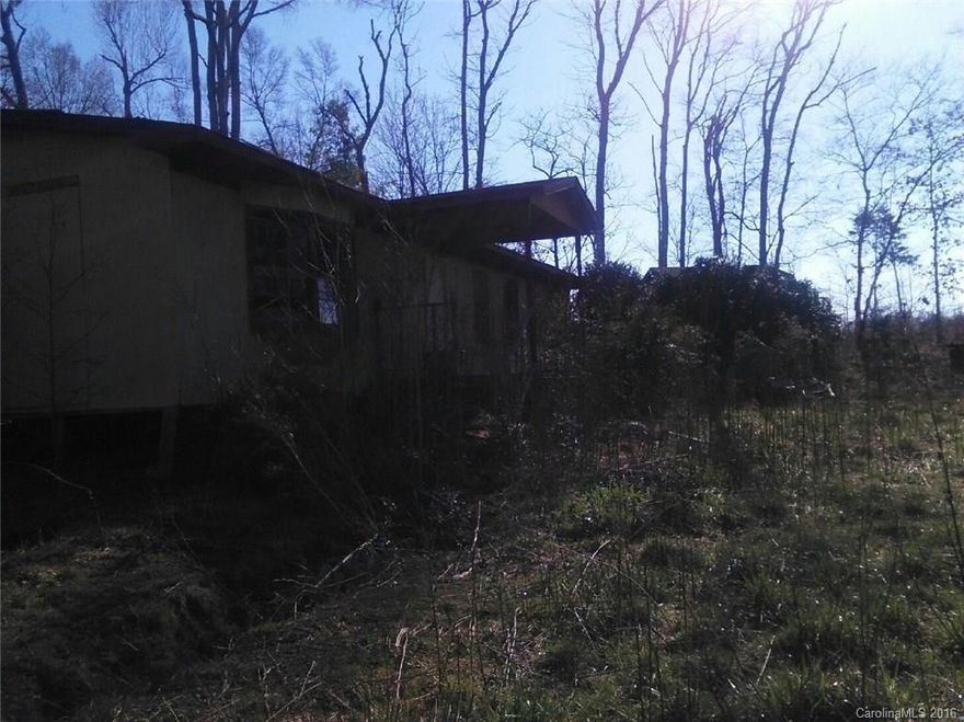 Sits on 1.16 acres. The home has little to no value, due to damage.