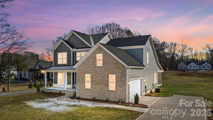 New Construction in Waxhaw!
Located in a beautiful area known for its charming downtown and convenient access to Charlotte, this brand-new home offers the perfect mix of small-town feel and modern comfort. Even better, this is one of two brand-new homes built side by side, a rare opportunity for friends or family who want to live next door to each other.

Just 7 miles from downtown Waxhaw, you’ll have quick access to local dining, shopping, and community events while still enjoying a peaceful setting.

The Roanoke floor plan welcomes you with a spacious front porch and inviting foyer. A private study at the front of the home makes the perfect office or flex space. The vaulted family room with a custom fireplace creates an open, airy gathering space filled with warmth and natural light.

The gourmet kitchen features a large island and walk-in pantry, flows seamlessly into the dining area, ideal for entertaining or everyday living.

The main-level primary suite offers a walk-in closet and spa-inspired bath complete with a soaking tub and walk-in shower. A first-floor laundry room adds convenience right where you need it.

Upstairs, you’ll find two additional bedrooms, plus another primary suite with its own ensuite bath and walk-in closet, perfect for guests or multi-generational living. An open loft provides flexible space for a media room, playroom, or second living area.

Step out onto the screened back porch and enjoy quiet mornings or relaxing evenings overlooking your private backyard.

A beautiful new home in a fantastic Waxhaw location, move-in ready and waiting for you.