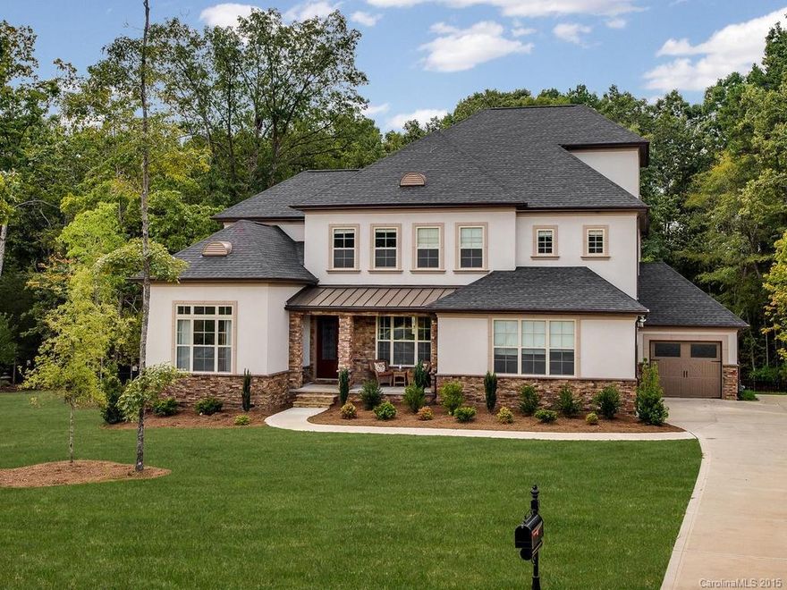 Amazing home customized by sellers like no other in the neighborhood. Large, private fenced cu-de-sac location w/common park area in front.  Covered front & rear porches.  Open floor-plan, wide plank hardwoods, elegant moldings, tons of natural light.  Over the top gourmet/cook's kitchen  usually found in homes over $1M.  Guest suite on main.  Spacious Master up w/custom closets.  3 add'l bedrooms, a loft & 2 full baths complete the 2nd level. Finished 3rd level creates a retreat/bonus.