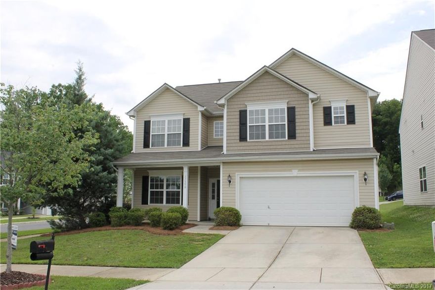 Situated on a corner lot in The Village at Brierfield, a community convenient to I485, I85, UNC Charlotte, the PNC pavilion and Concord Mills.  This Former Model home has speakers in most rooms, fresh paint and new carpet, landscape lighting and an irrigation system.  Formal dining room with hardwood floors and an open kitchen-living room area perfect for entertaining.  Make sure to check out the size of the secondary bedrooms upstairs, one is almost big enough to be a second master!