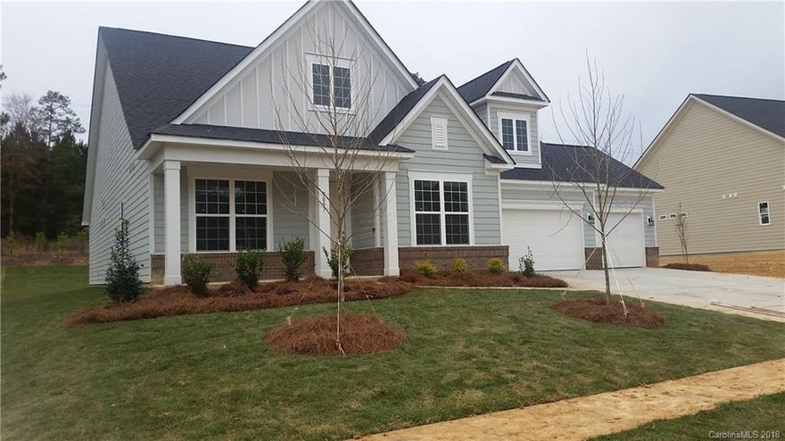 Beautiful 3 bedroom 3.5 bathroom ranch with open concept. 3 car garage with tandem, upstairs loft with bedroom suite. Gourmet kitchen with enormous island, tankless gas water heater, gorgeous built in cabinets in living room, upgraded trim throughout the entire home. Home is located on cul-de-sac with a wooded view. Located in Indian Land near Ballantyne. Close proximity to shopping and restaurants.  5500. in Closing Costs paid with preferred lender
This is a must see home with plenty of storage area. December completion. Master suite is on main with large walk in shower.