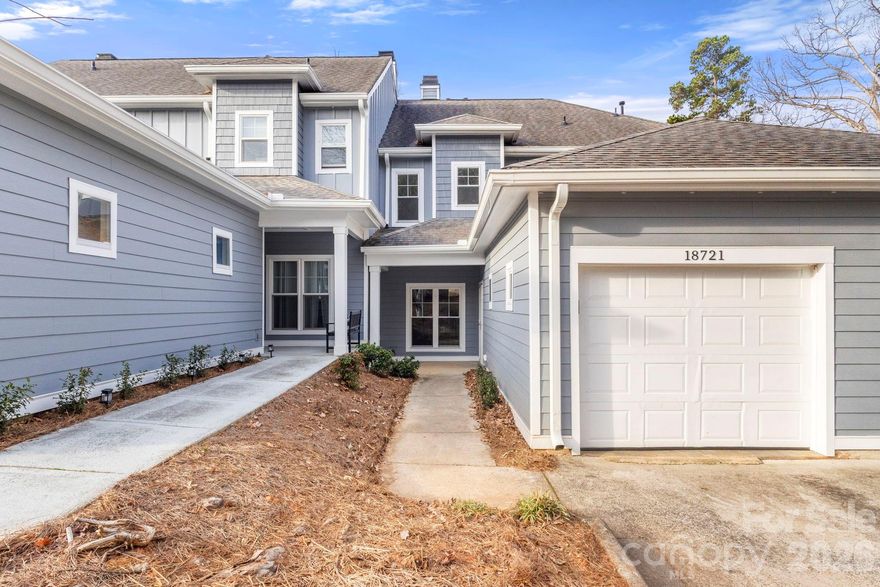Located in the sought-after Silver Quay community, this beautifully updated townhome offers year-round views of Lake Norman and a prime position within the neighborhood. Recently remodeled and truly move-in ready, the home features durable LVP flooring throughout, fresh interior paint, and a stylishly updated primary bathroom. The main living areas are highlighted by a striking see-through fireplace that creates a warm focal point between the living and dining rooms, while the kitchen offers stainless steel appliances and granite countertops. Enjoy seamless indoor-outdoor living with a sunroom showcasing floor-to-ceiling windows and a patio complete with a gas hookup for grilling or a fire pit. A one-car garage provides convenient parking and additional storage. Silver Quay residents enjoy exceptional amenities, including 370 feet of shoreline, lake access with a boat ramp, paddleboard and kayak launch with storage, community dock, lakeside pool, picnic areas, walking trails, and tennis, pickleball, and basketball court, with potential boat slip rentals available through the HOA. Conveniently located near shopping, dining, top-rated schools, and I-77, this home offers the perfect balance of low-maintenance living and an active lakefront lifestyle.