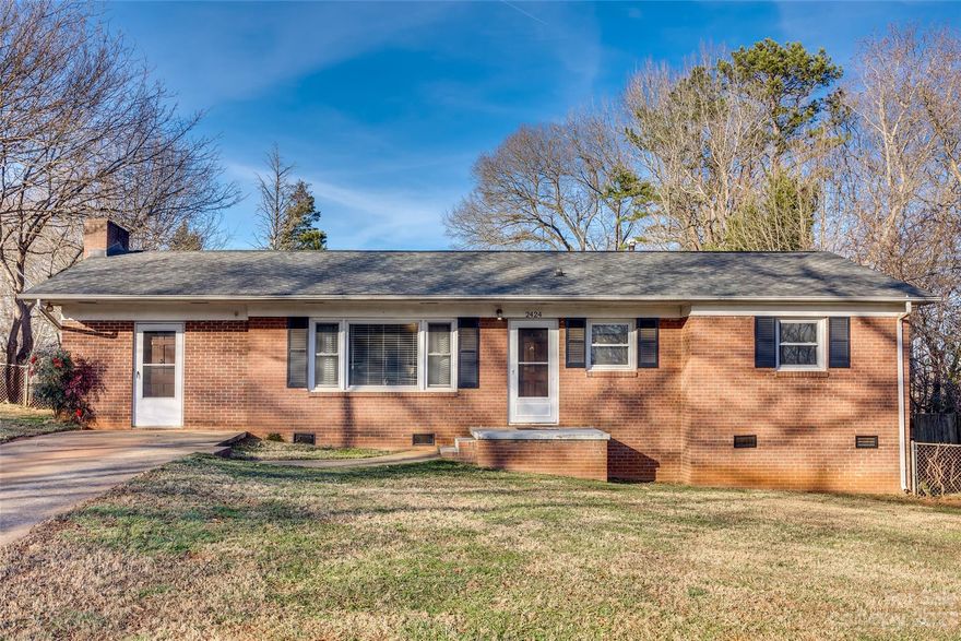 Introducing a fantastic opportunity in Gastonia, NC! This charming 3-bedroom, 1.5-bathroom brick ranch is a gem awaiting your vision. Step into the cozy den featuring a gas fireplace, creating the perfect ambiance for relaxation and entertainment. Outside, a fenced backyard and a sizable storage building adds convenience and extra space for your storage needs. This property is not just a home; it's an investment waiting to be realized. Whether you're an investor looking for a promising venture or a buyer with a vision for customization, this residence holds immense potential. The seller sweetens the deal by offering a $5000 credit at closing, giving you the flexibility to use it towards paint or repairs of your choosing. Seize this opportunity to transform a house into your dream home or capitalize on a strategic investment.