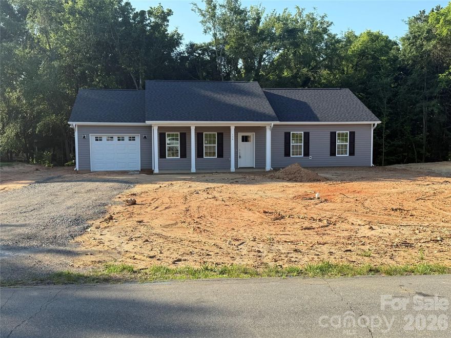 One-story NEW construction in an established Mocksville neighborhood. This classic home features an open floor plan with a vaulted great room and quartz countertops throughout. Situated on a quiet cul-da-sac, this concrete back patio is perfect for relaxing or entertaining.