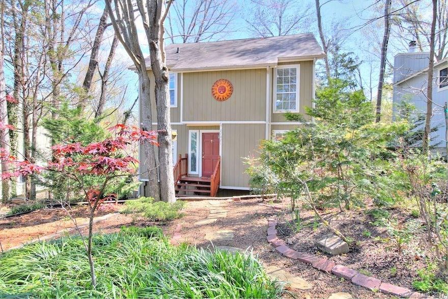 Sunny, open & cottagey charming retreat in the heart of Tega Cay. Sunroom with open views of a bird sanctuary.  Very private and wooded. Cozy wood burning stove. Kitchen with island open to family room. Grilling deck plus covered lower level rear porch/deck to just kick back, relax and enjoy nature! A rare find at this offering price in Tega Cay.  One year home warranty through American Homeshield.